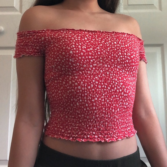 red top with white flowers